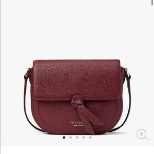 Kate spade medium saddle crossbody in maroon